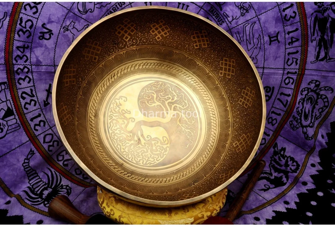 Yin Yang engraved on a large Himalayan singing bowl — symbol of balance between opposing forces