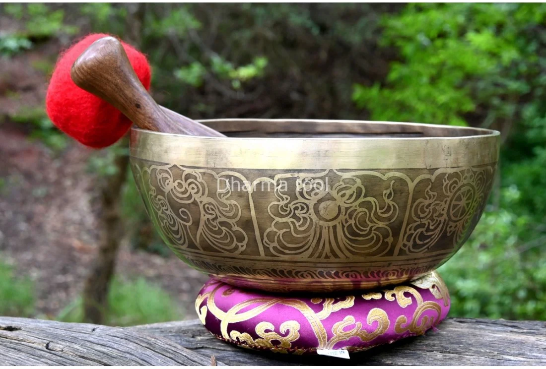 Eight Auspicious Symbols (Ashtamangala) etched large Tibetan singing bowl Ashtamangala Austamangal eight auspicious symbols etched around a large Tibetan singing bowl from Nepal