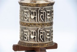 8-Inch Tall Tabletop Tibetan Prayer Wheel – Silver Finish with Mantra Roll