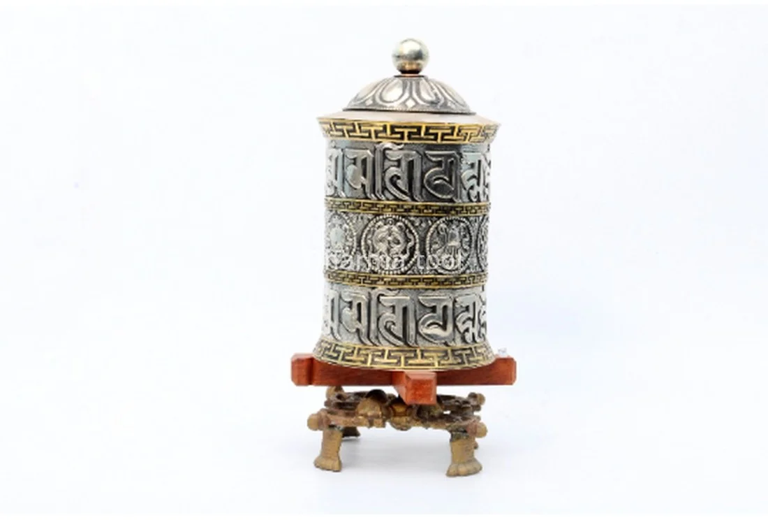 Eight Auspicious Symbols Ashtamangala embossed around a 14-inch tabletop Tibetan prayer wheel handmade in Nepal