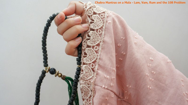 Reciting the Chakra Mantras on a Mala