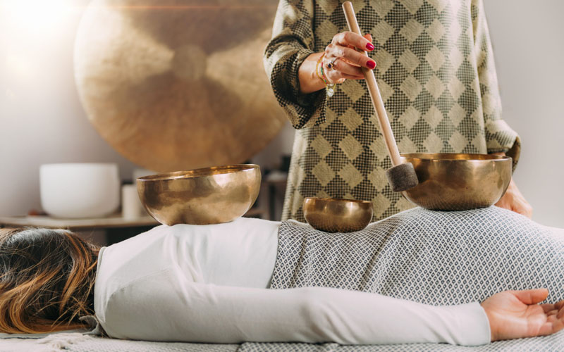 Chakra alignment setup of singing bowls for sound healing and meditation