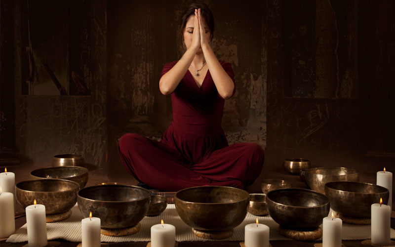 Practitioner centered singing bowl setup for easy access and smooth sound healing flow