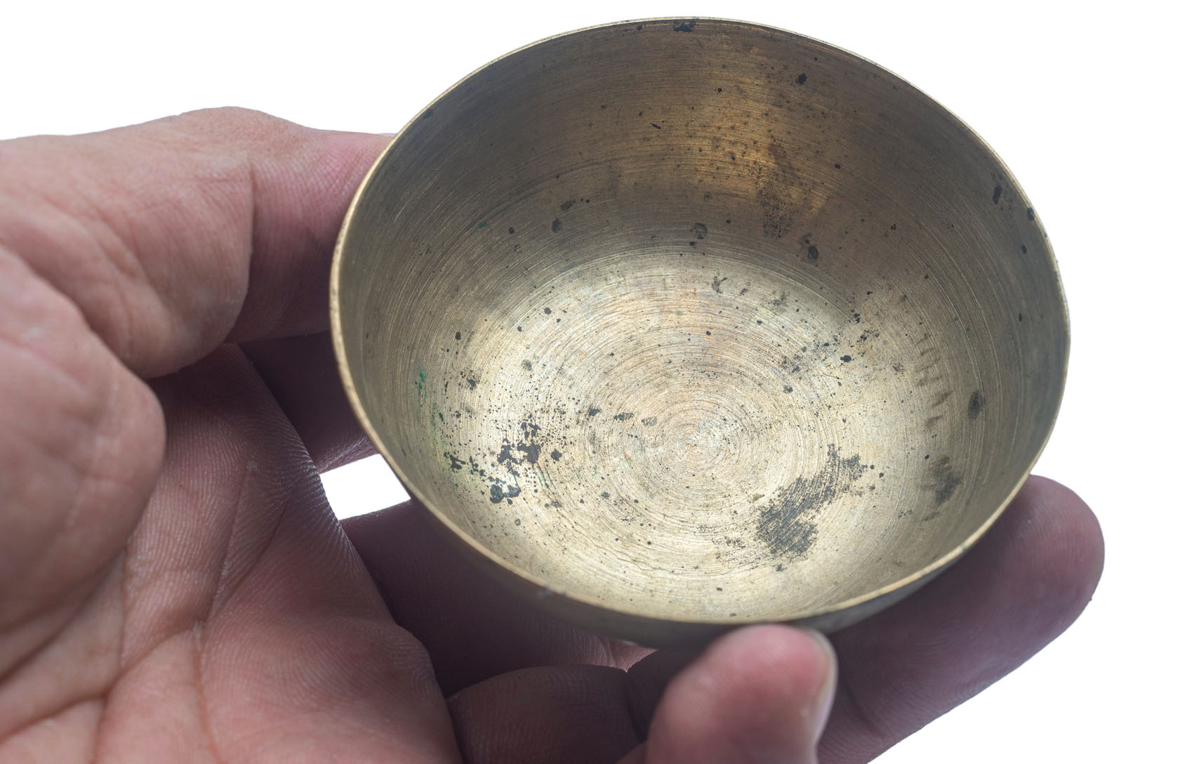 Small antique singing bowl — how bronze and tone change over decades of use Small antique Tibetan singing bowl with aged bronze patina and a rim worn smooth from generations of playing