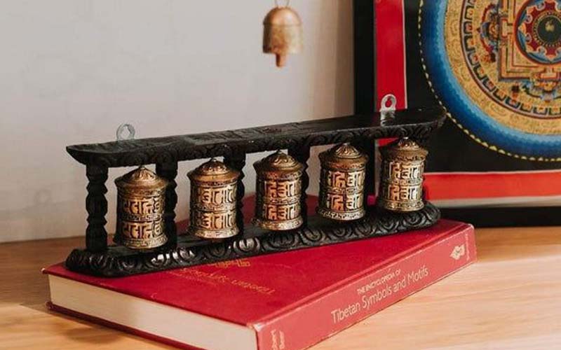 Benefits of rotating Tibetan prayer wheel for spiritual practice, meditation, and positive energy