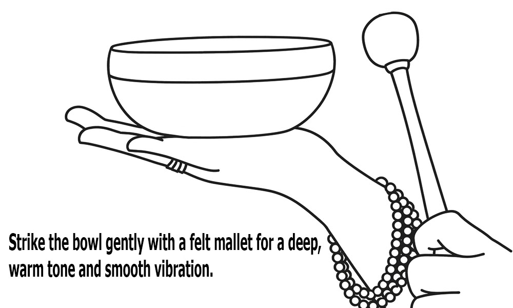 Striking singing bowl with felt striker
